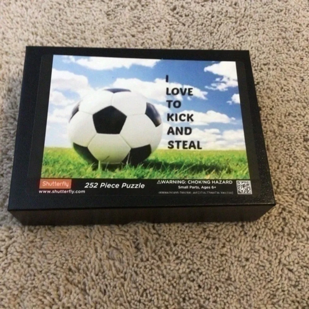 252 piece soccer  puzzle I love to kick and steal